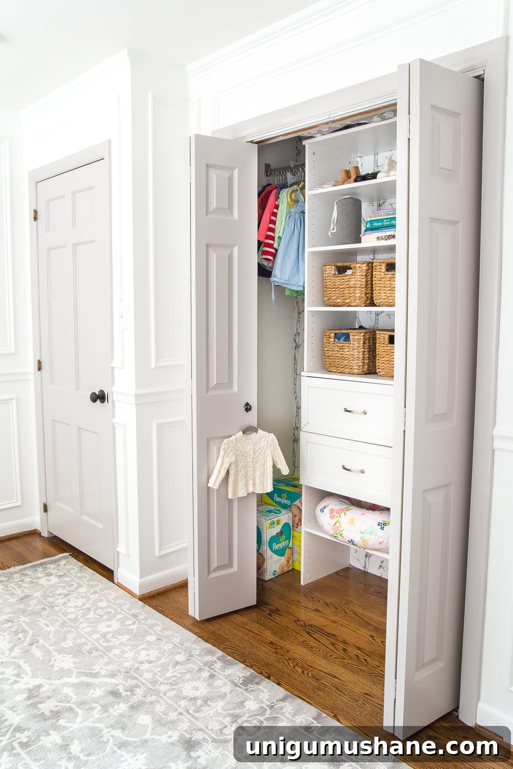 Nursery Closet Makeover Reveal with Free Printable Dividers 9 A full organizational overhaul on a nursery closet that is packed full of functional storage solutions for baby, plus a free closet divider printable set.