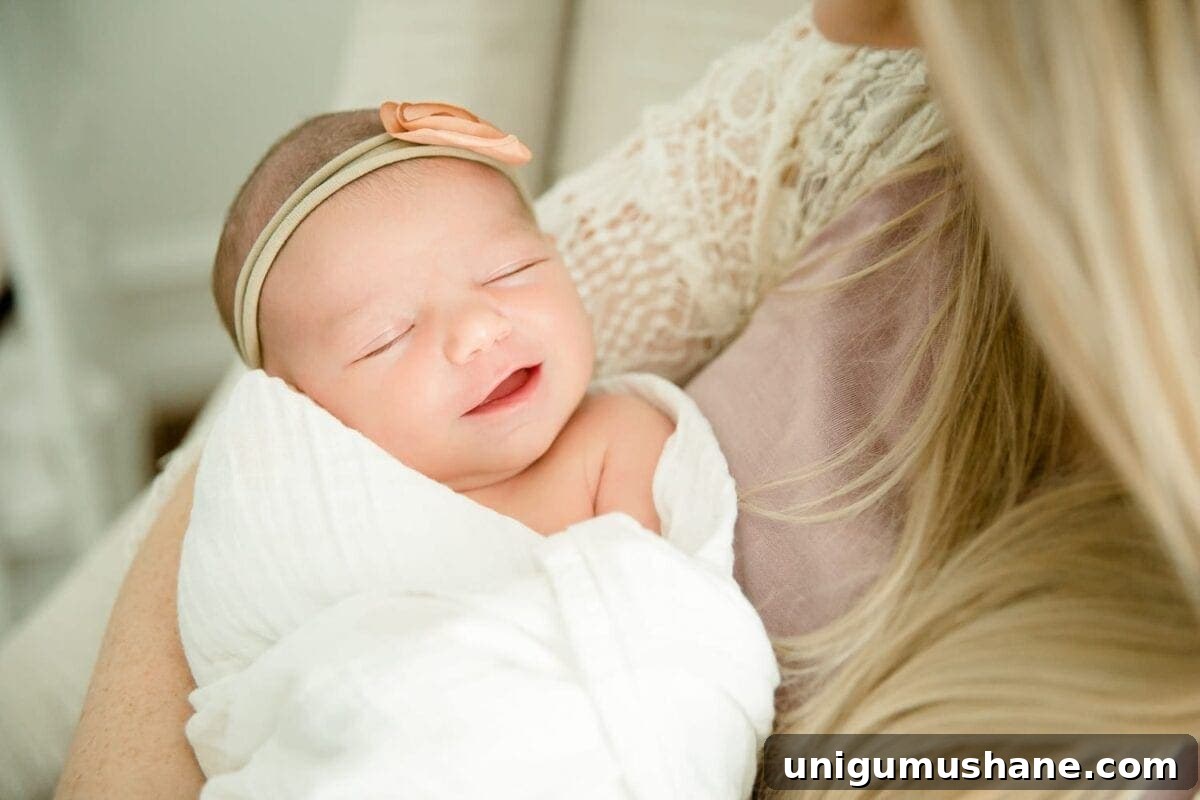 Regan's Birth Story: Welcoming Our Family of Four 8 Smiling newborn Regan