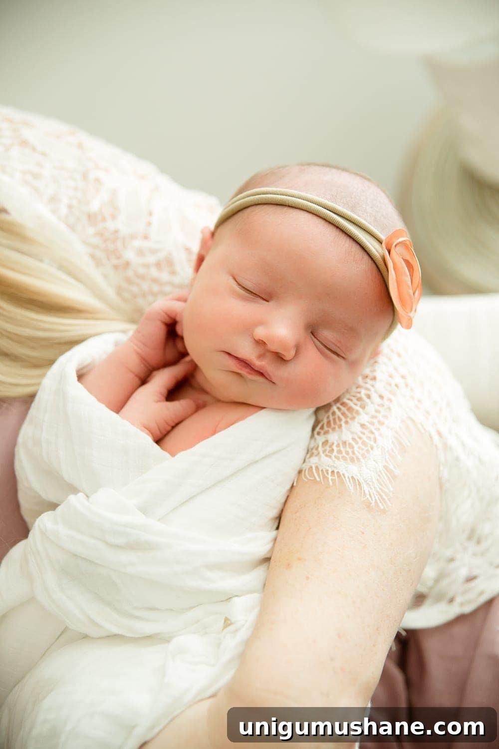 Regan's Birth Story: Welcoming Our Family of Four 9 Mom holding baby in hospital bed
