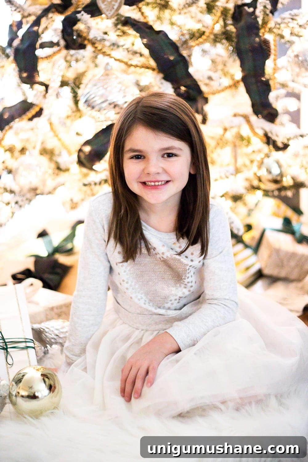 20 DIY Family Christmas Photo Ideas to Capture at Home 9 how to take your own christmas family photos in front of your tree