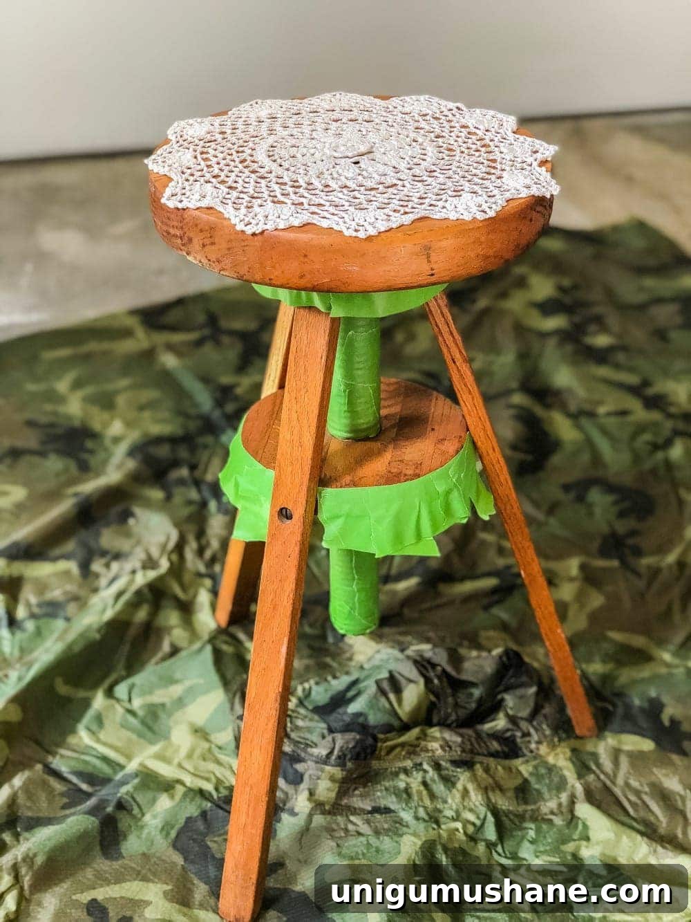 Repurpose a Piano Stool into a Stylish Plant Stand 4 A global designer-inspired DIY plant stand made from a thrifted piano stool using just spray paint and a doily for a quick and easy makeover. #plantstand #pianostool #globaldecor #spraypaint #thriftstoreflips #thrifting #diyhomedecor #thriftedhomedecor