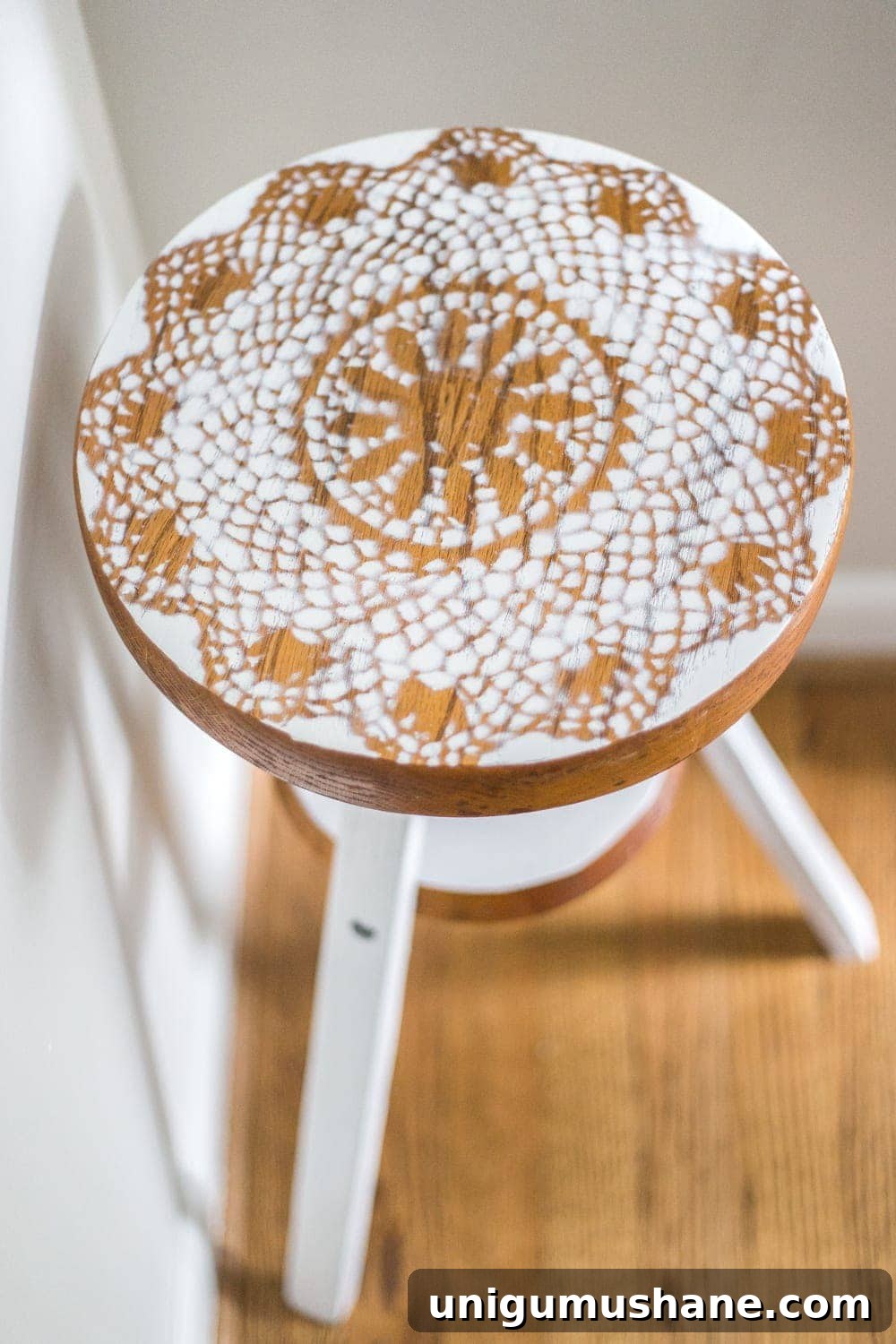 Repurpose a Piano Stool into a Stylish Plant Stand 6 A global designer-inspired DIY plant stand made from a thrifted piano stool using just spray paint and a doily for a quick and easy makeover. #plantstand #pianostool #globaldecor #spraypaint #thriftstoreflips #thrifting #diyhomedecor #thriftedhomedecor
