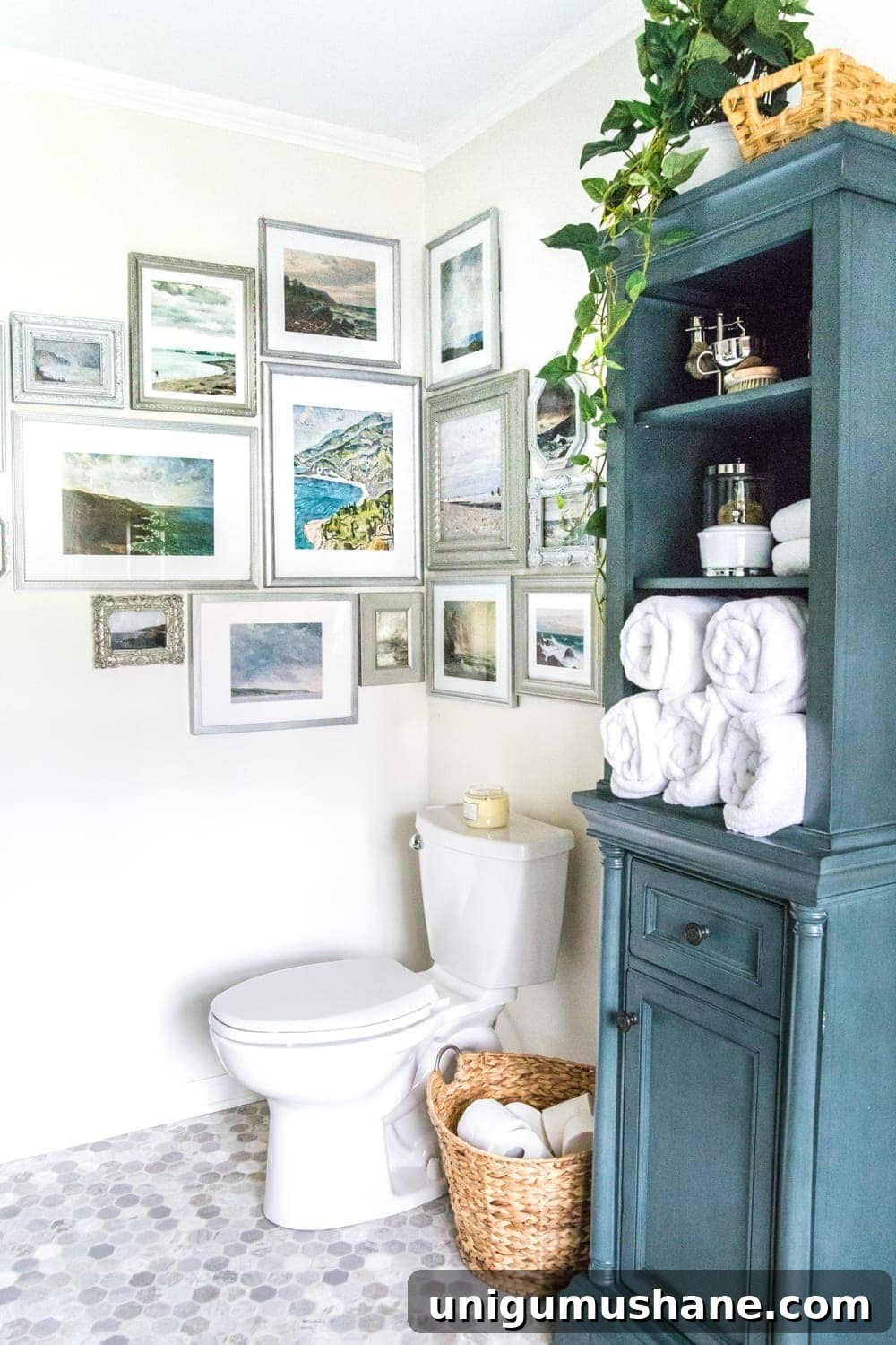 Coastal Gallery Wall Printables: Beach Wall Art Set 7 A free printable set of a coastal gallery wall featuring antique ocean paintings and how to frame them inexpensively with thrifted finds. #coastaldecor #gallerywall #bathroomart #bathroomwall #bathroomdecor #coastalart