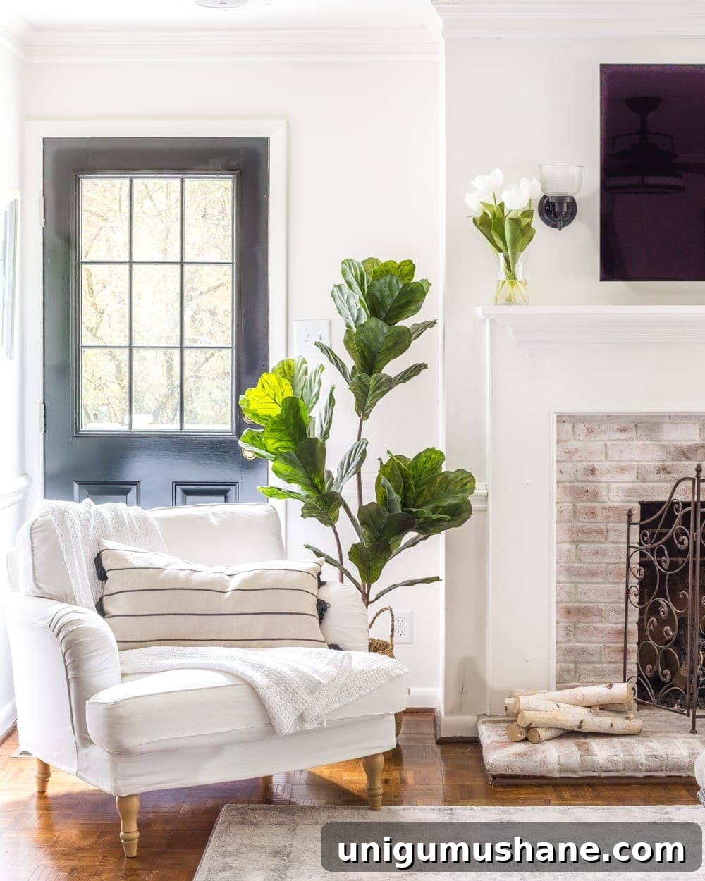 Spring Home Tour: Fresh Decor Ideas for Every Room 12 Simple Spring Home Tour | Neutral living room decorated with artificial fiddle leaf fig and IKEA furniture