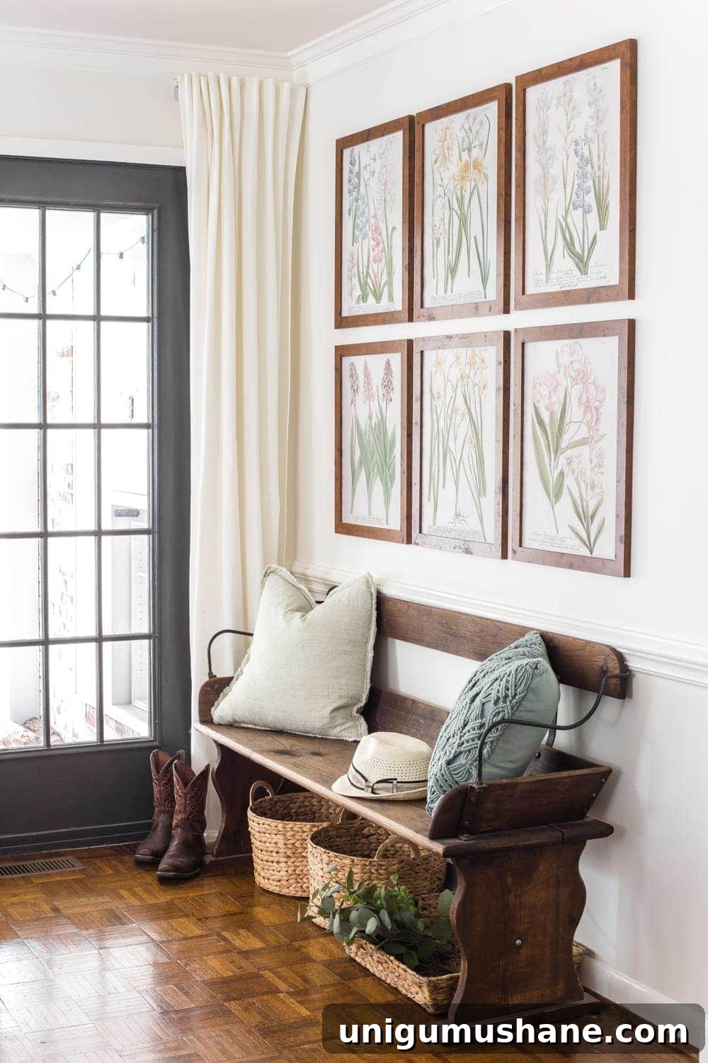 Spring Home Tour: Fresh Decor Ideas for Every Room 13 Simple Spring Home Tour | Craigslist bench with baskets underneath for a makeshift mud room and free botanical prints for spring.