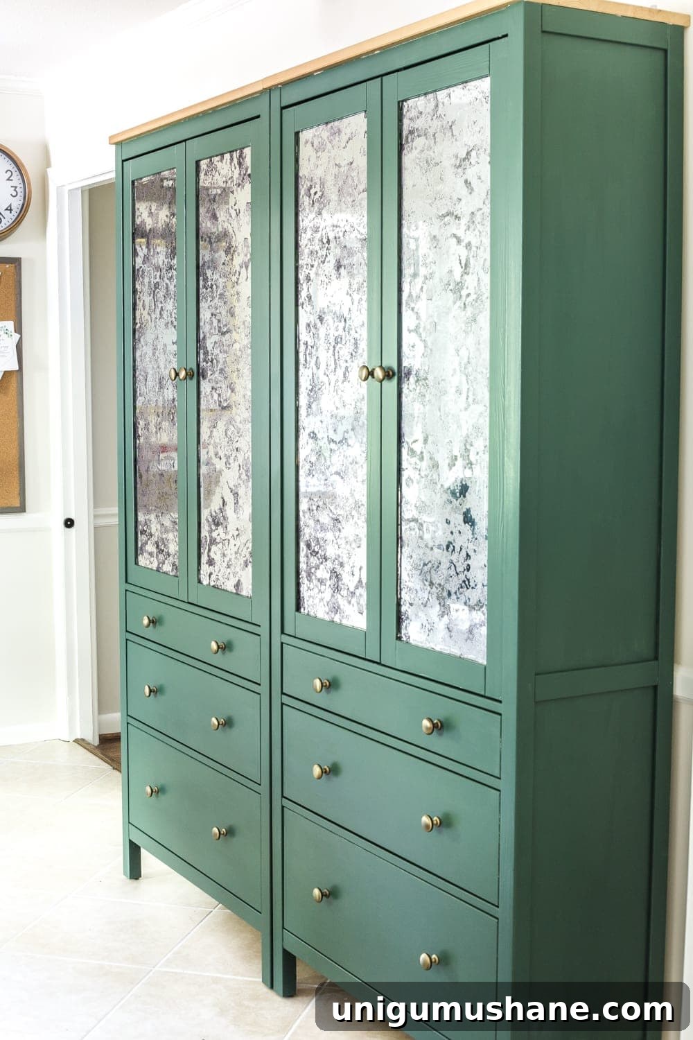 Build an IKEA Pantry Cabinet with Hemnes 16 DIY IKEA Hemnes Pantry Cabinet painted green with brass knobs