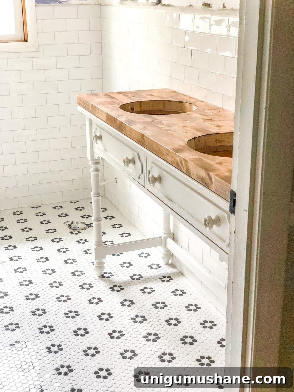 Convert a Console Table Into a Stylish Bathroom Vanity 14 How to Turn a Console Table Into a Bathroom Vanity | blesserhouse.com - A tutorial for how to reconstruct a console table to repurpose as a bathroom vanity and leave drawers functional underneath sinks.