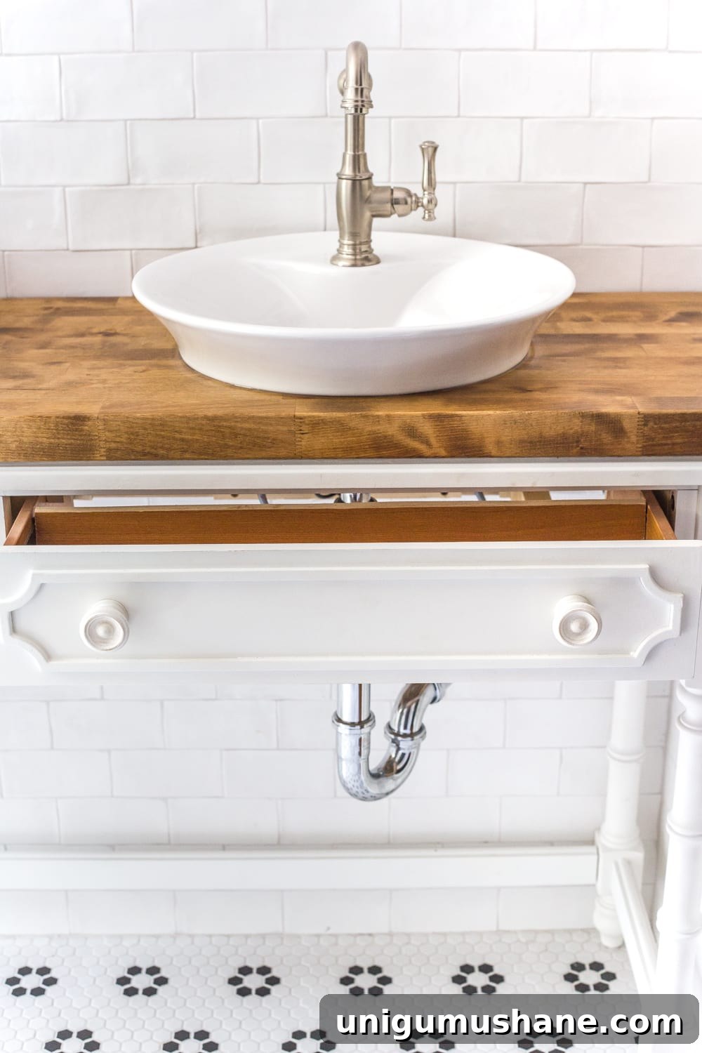Convert a Console Table Into a Stylish Bathroom Vanity 15 How to Turn a Console Table Into a Bathroom Vanity | blesserhouse.com - A tutorial for how to reconstruct a console table to repurpose as a bathroom vanity and leave drawers functional underneath sinks.