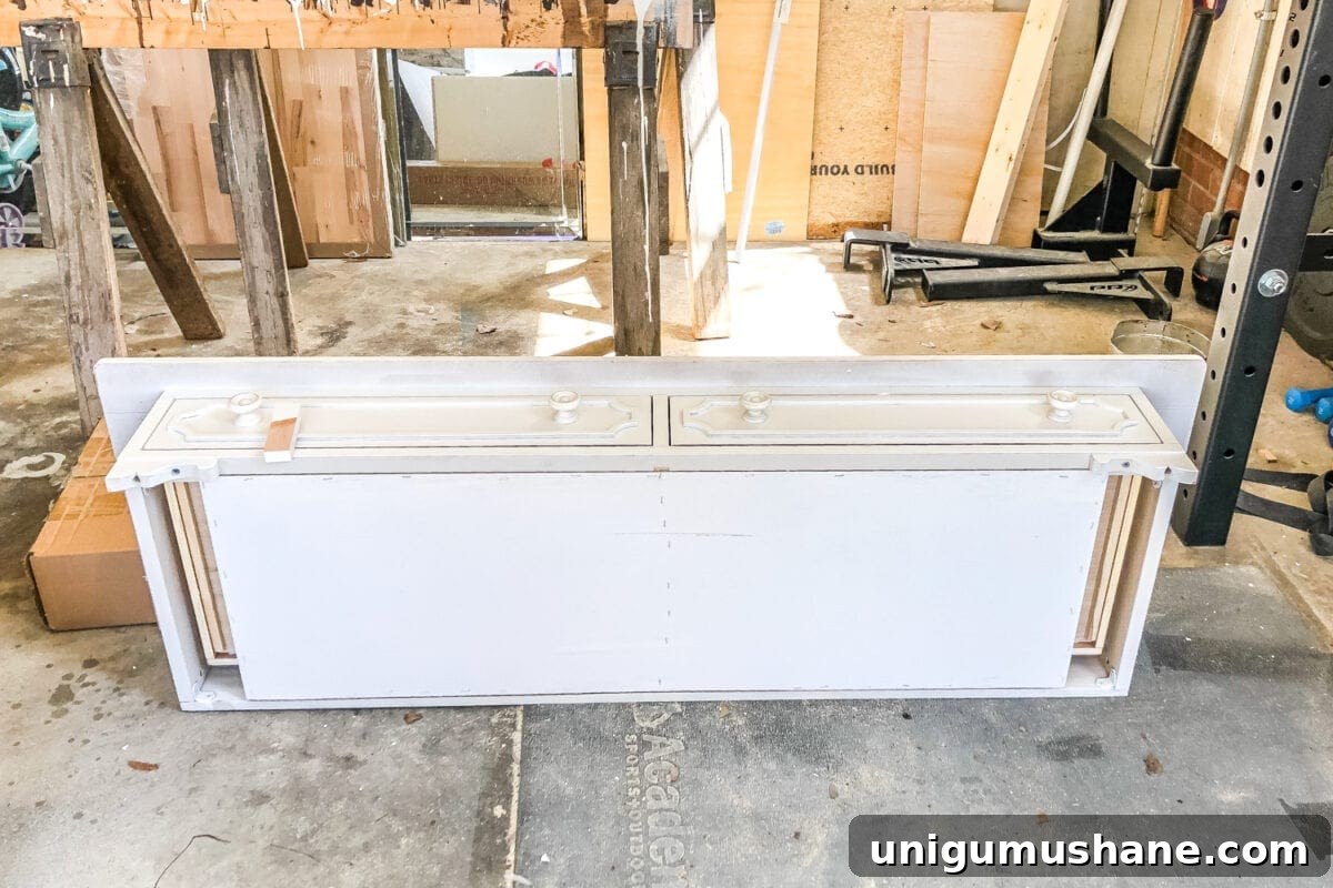Convert a Console Table Into a Stylish Bathroom Vanity 4 How to Turn a Console Table Into a Bathroom Vanity | blesserhouse.com - A tutorial for how to reconstruct a console table to repurpose as a bathroom vanity and leave drawers functional underneath sinks.