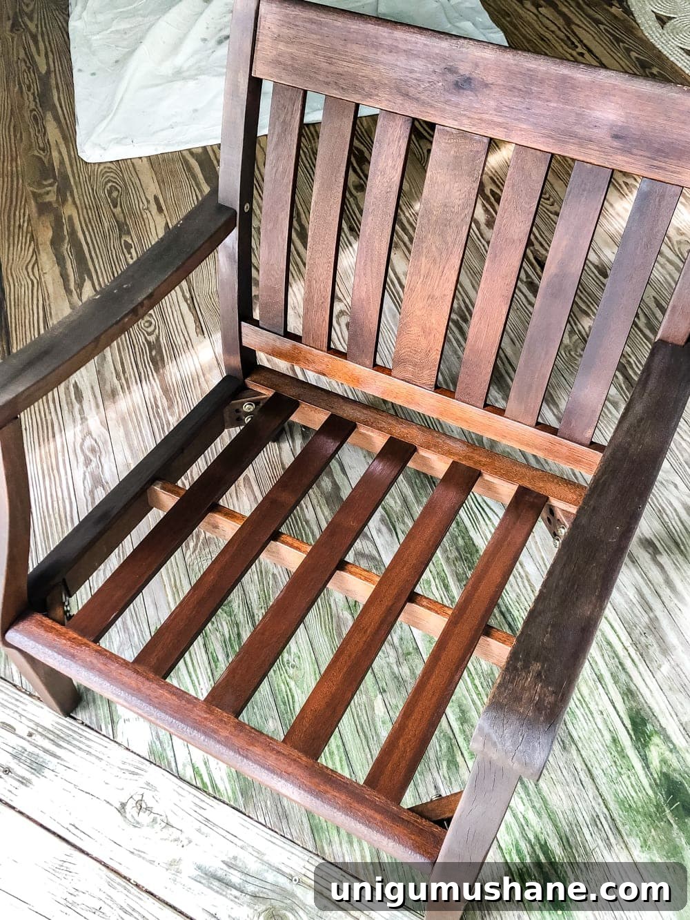 Restore Weathered Outdoor Wood Furniture in 7 Steps 7 Outdoor wood furniture soaking up teak oil