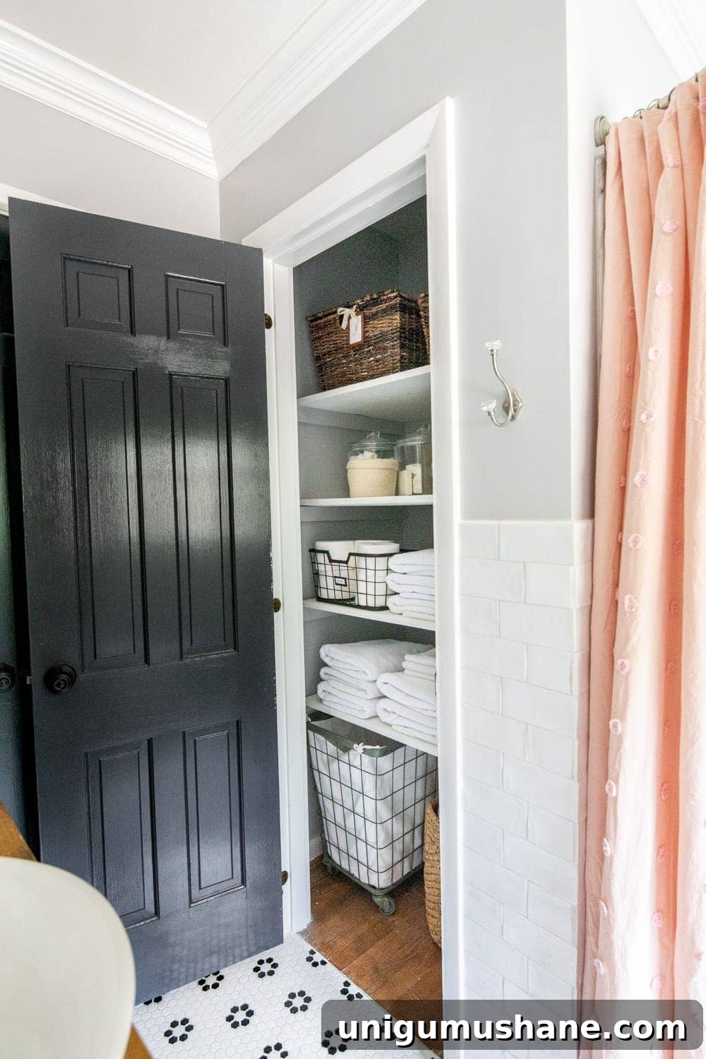 Whimsical, classic kids bathroom makeover | linen closet organization