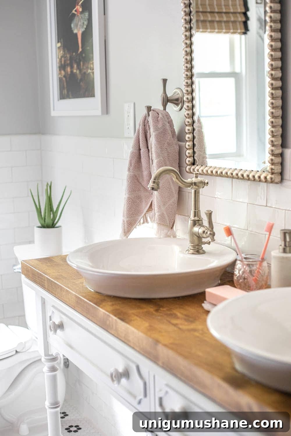 Whimsical, classic kids bathroom makeover | vessel sinks on a converted console table for a bathroom vanity