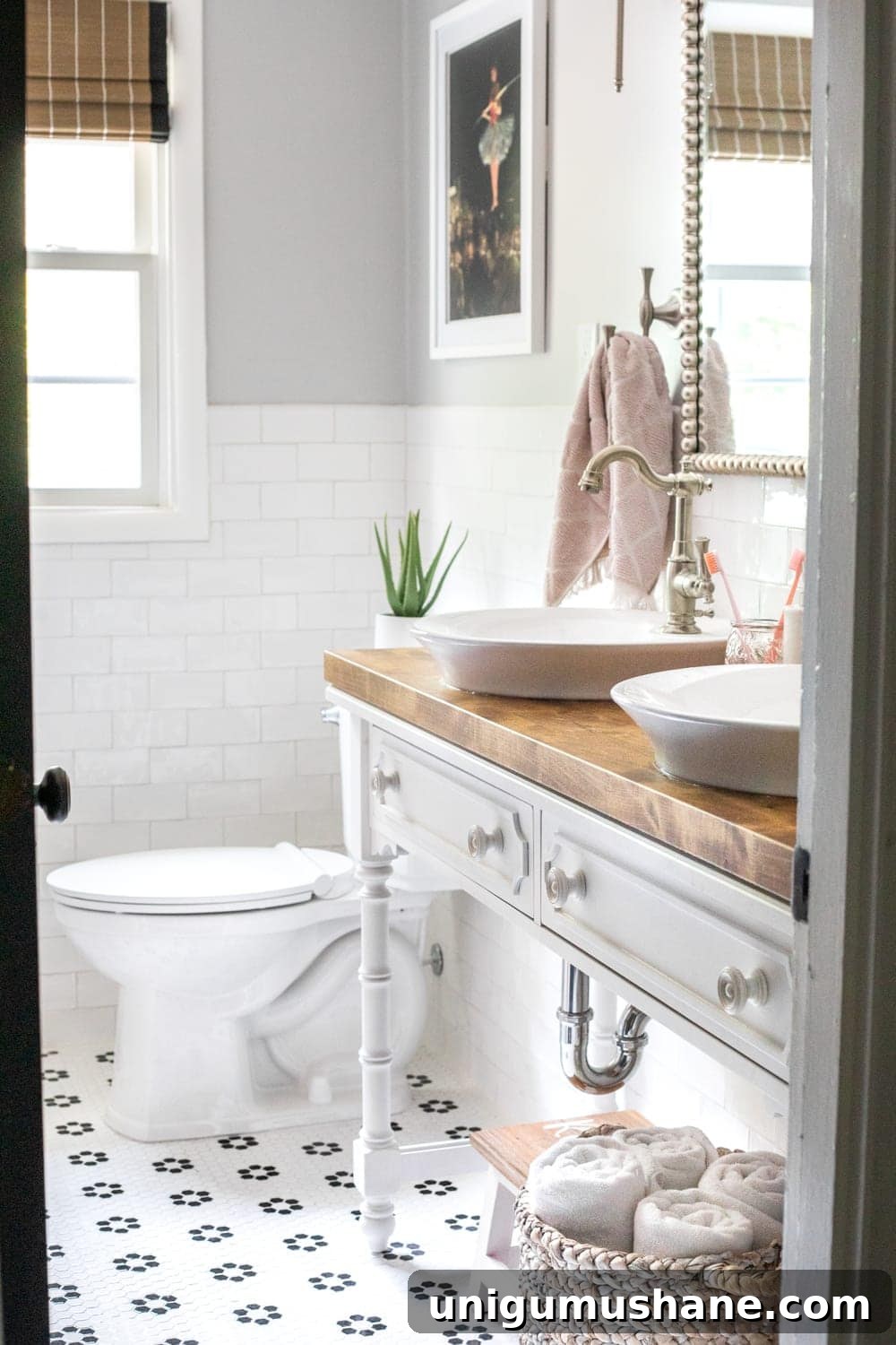 Girls' Bathroom Decor Details & Sources | Console table converted into a vanity with vessel sinks and retro flower floor tile