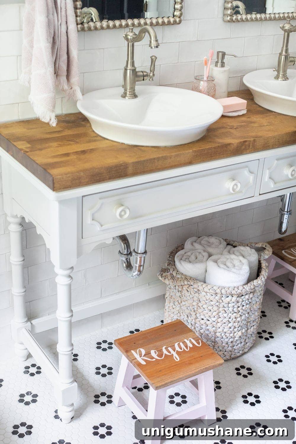 Girls' Bathroom Decor Details & Sources | Console table converted into a vanity with vessel sinks and personalized step stools