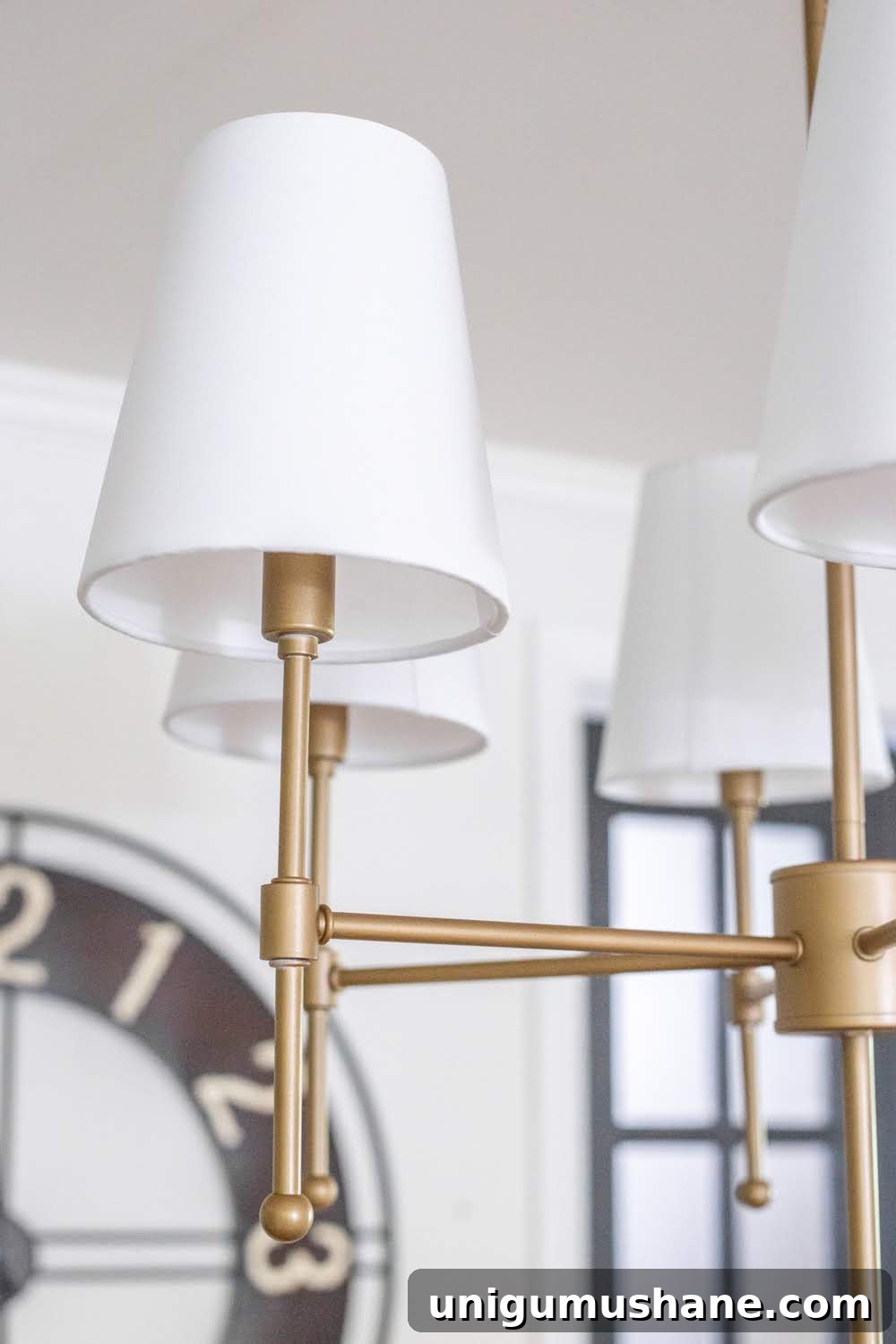 Chandelier Makeover: Which Brass Spray Paint to Use 8 Chandelier after three thin coats of metallic gold