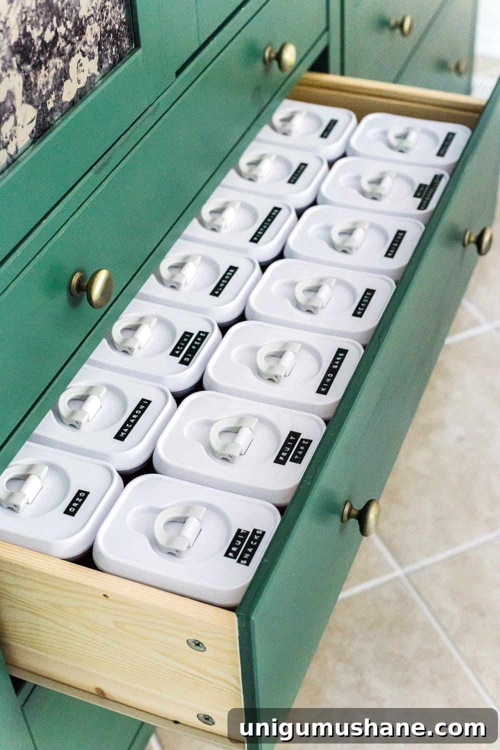 IKEA Hemnes Pantry Cabinet Organization - Tips and ideas for maximizing storage and creating function for food storage in a cabinet to repurpose as a pantry. #pantryorganization