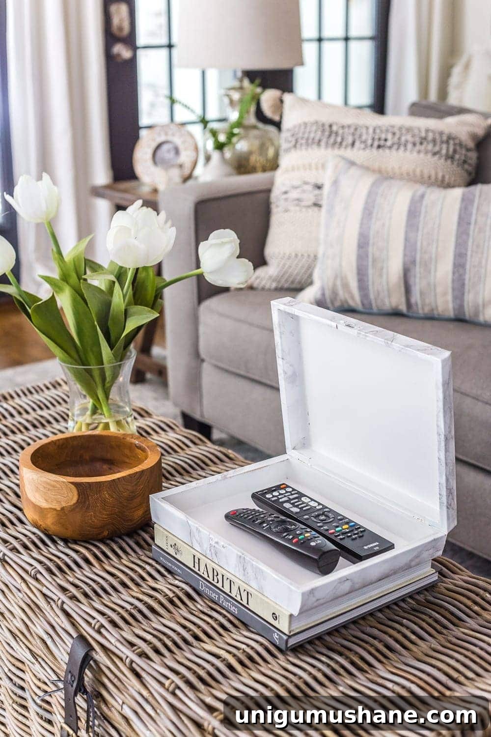 How to wrap a cigar box with contact paper to repurpose into a decorative remote control holder for a coffee table. #remotecontrolholder #coffeetabledecor