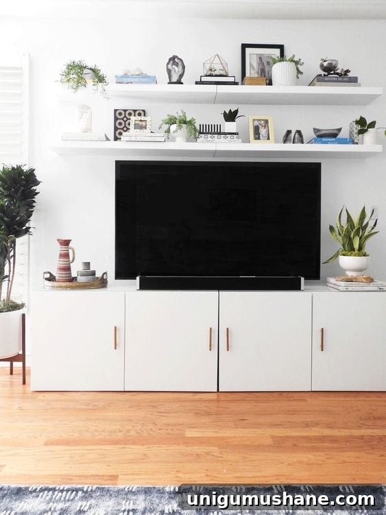 Add floating shelves above a TV for a built-in look on the cheap.