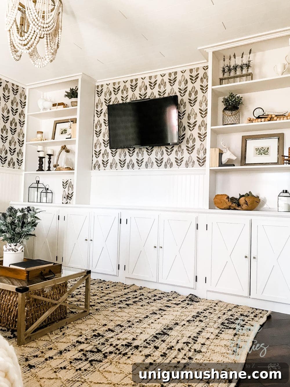 Put up pretty wallpaper behind a TV. A little pattern can go a long way and make your TV look cute in the process. 