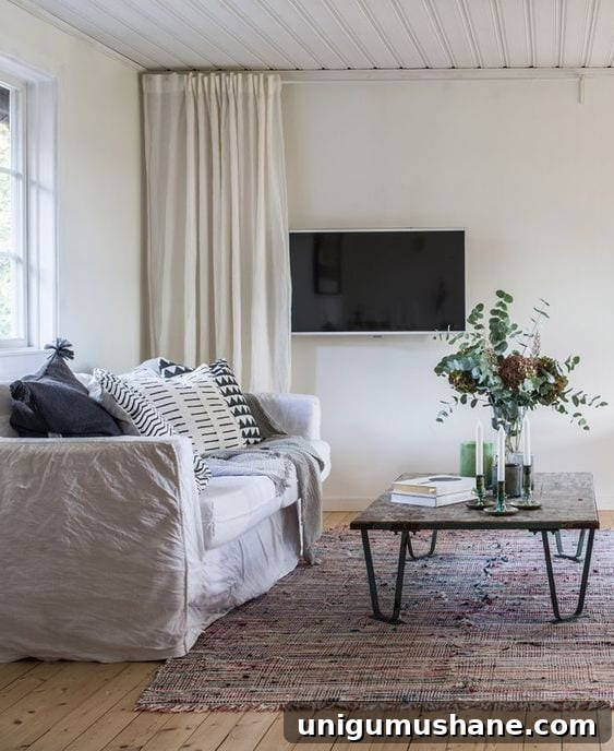 Hide your TV behind a curtain
