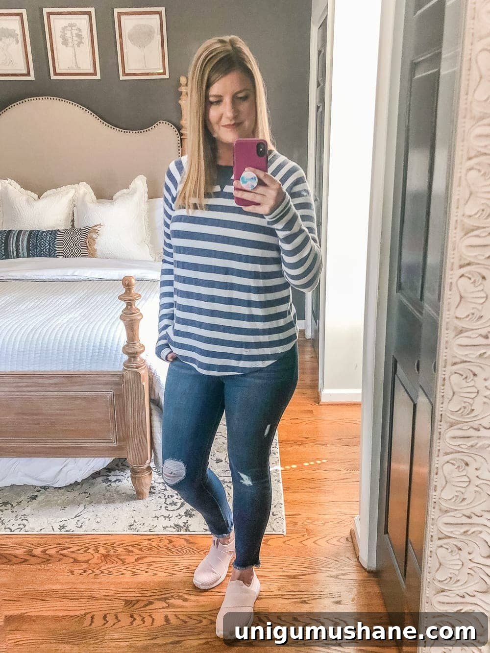 7 Inexpensive Tummy Hiding Mom Friendly Fall Outfits - Pullover shirt, distressed jeans, and slip-on sneakers