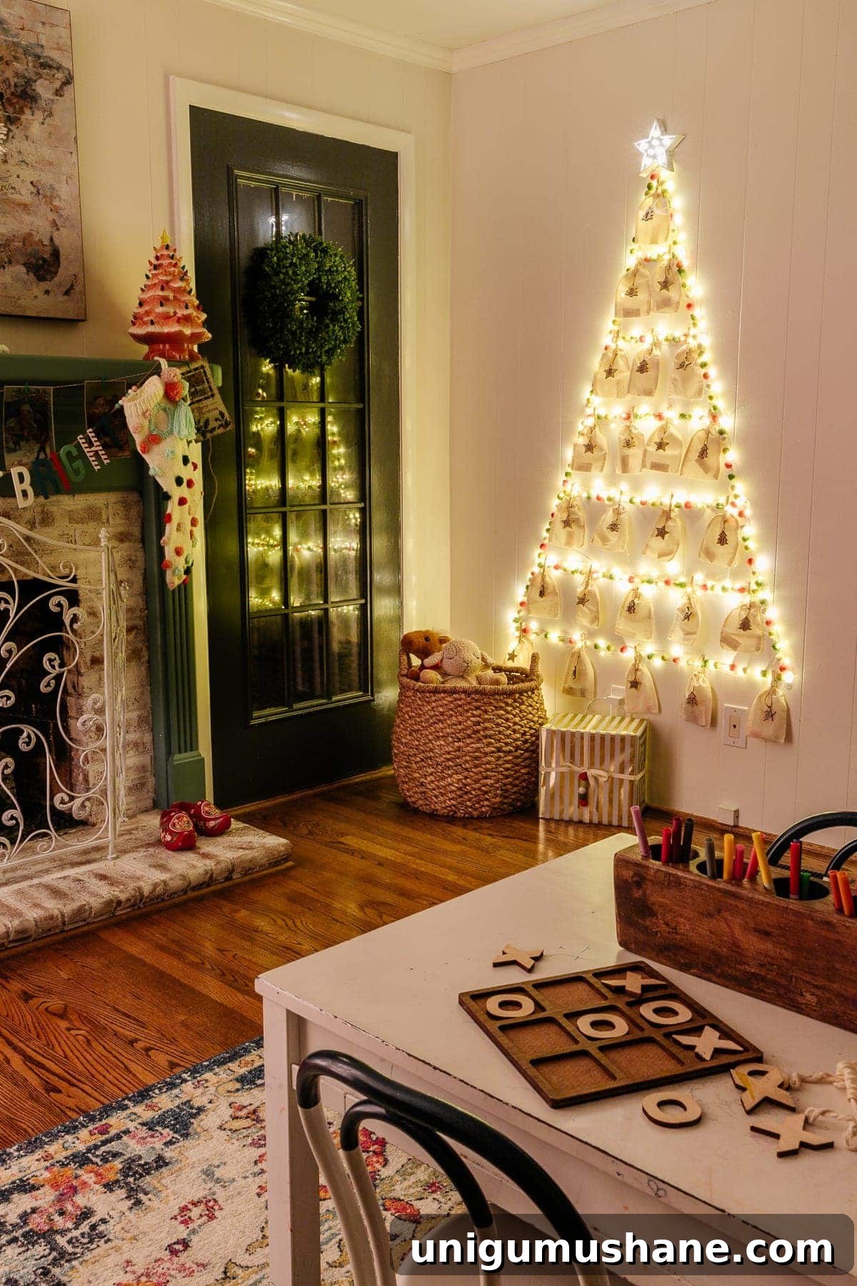 kids' DIY Advent calendar on a wall in a playroom