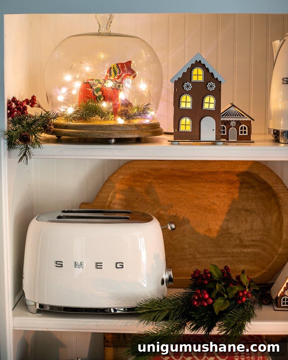 Mix Sentimental Heirlooms with New Decor for a Swedish Christmas 6 Swedish Christmas kitchen shelves styled with Dala horse and gingerbread