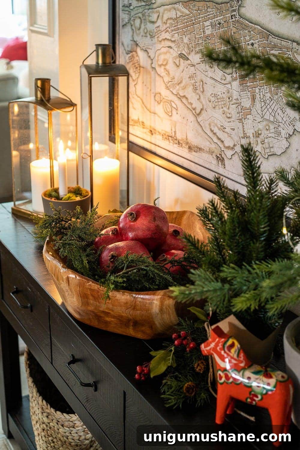 Mix Sentimental Heirlooms with New Decor for a Swedish Christmas 9 Swedish Christmas with Dala horse, candlelight, and pomegranates in a bowl.