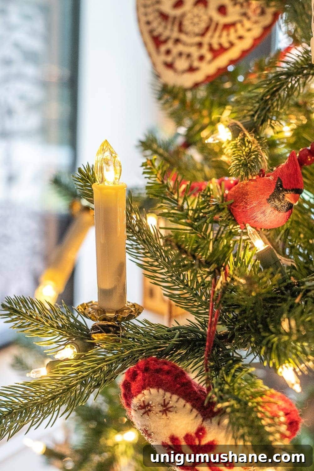 DIY Antique-Style Christmas Tree Candles 8 DIY brass christmas tree candle on a branch