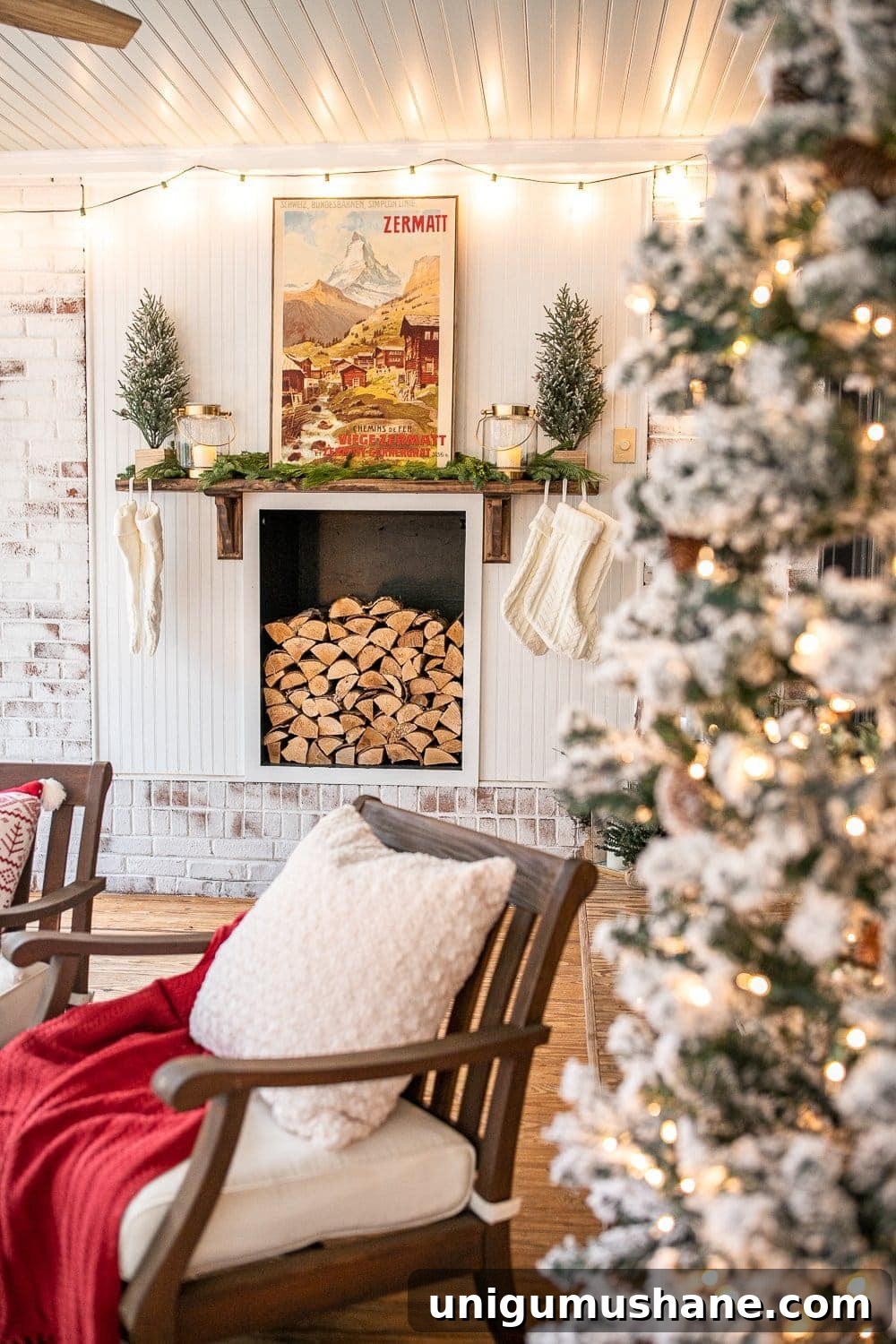 Cozy Christmas Decorating Ideas for Your Back Porch 5 Faux fireplace with wood stack and cozy Christmas decor