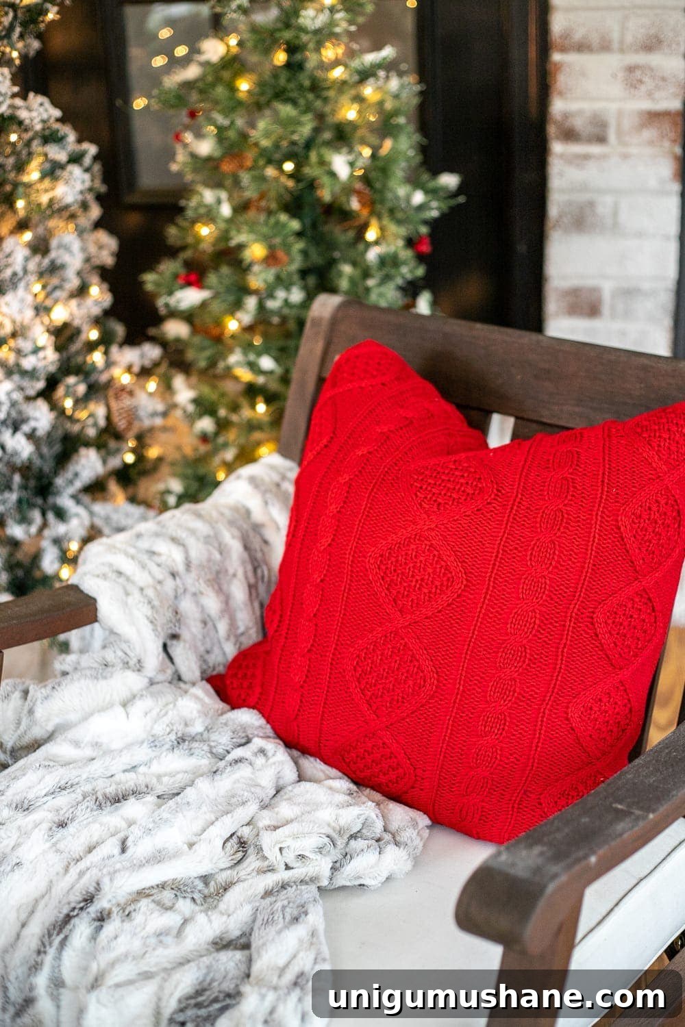 Cozy Christmas Decorating Ideas for Your Back Porch 7 Cozy Christmas throw pillow and faux fur blanket