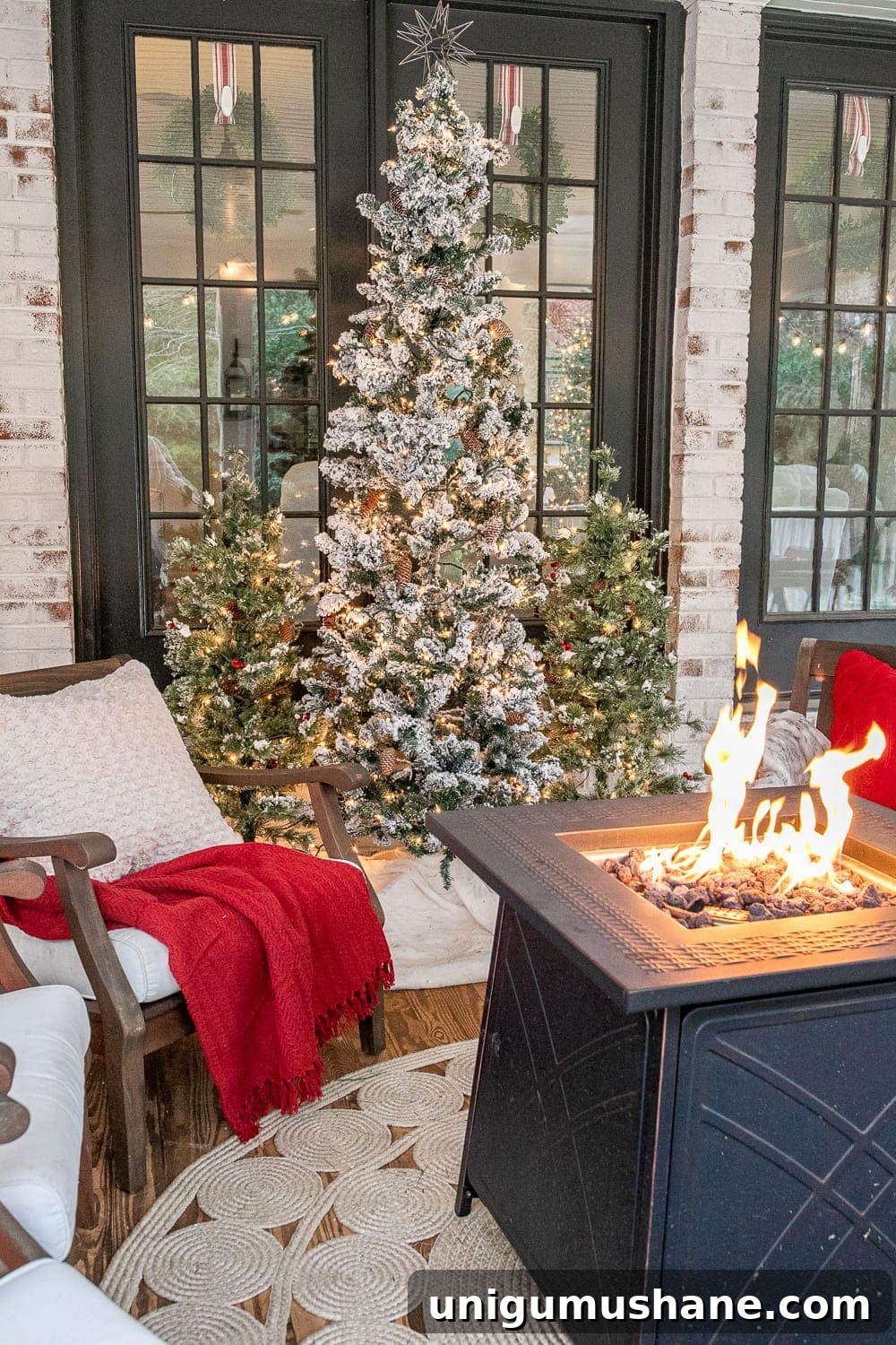 Cozy Christmas Decorating Ideas for Your Back Porch 9 Back porch fire pit table and Christmas trees