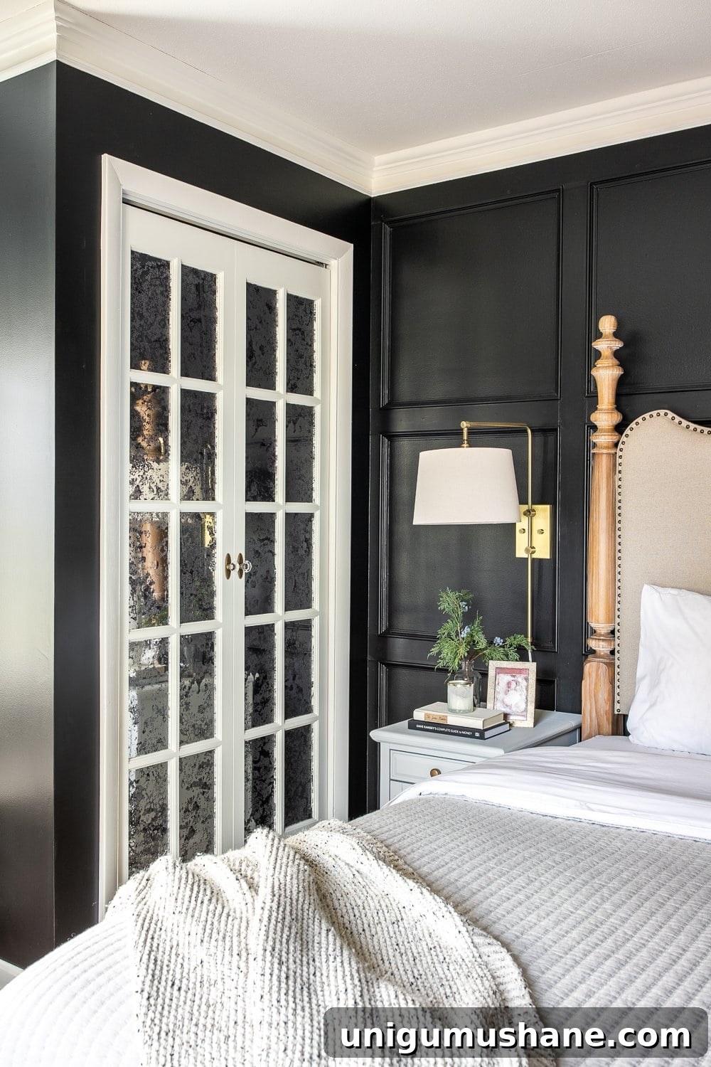 Mirrored French Closet Doors | How we created a vintage style, glamorous solution for our bifold doors on our master bedroom's his and her closets for added light and texture.