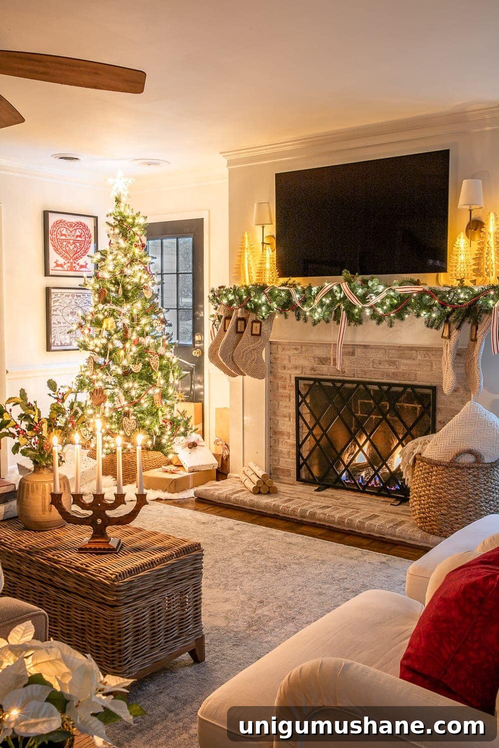 Christmas living room at night with fireplace and tree