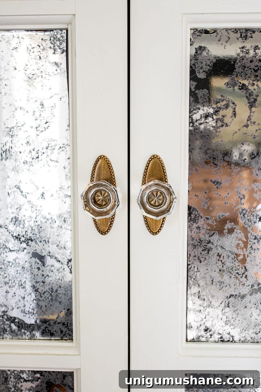 Moody Modern Vintage Master Bedroom Reveal and Design Ideas 9 antique style bifold closet door knobs