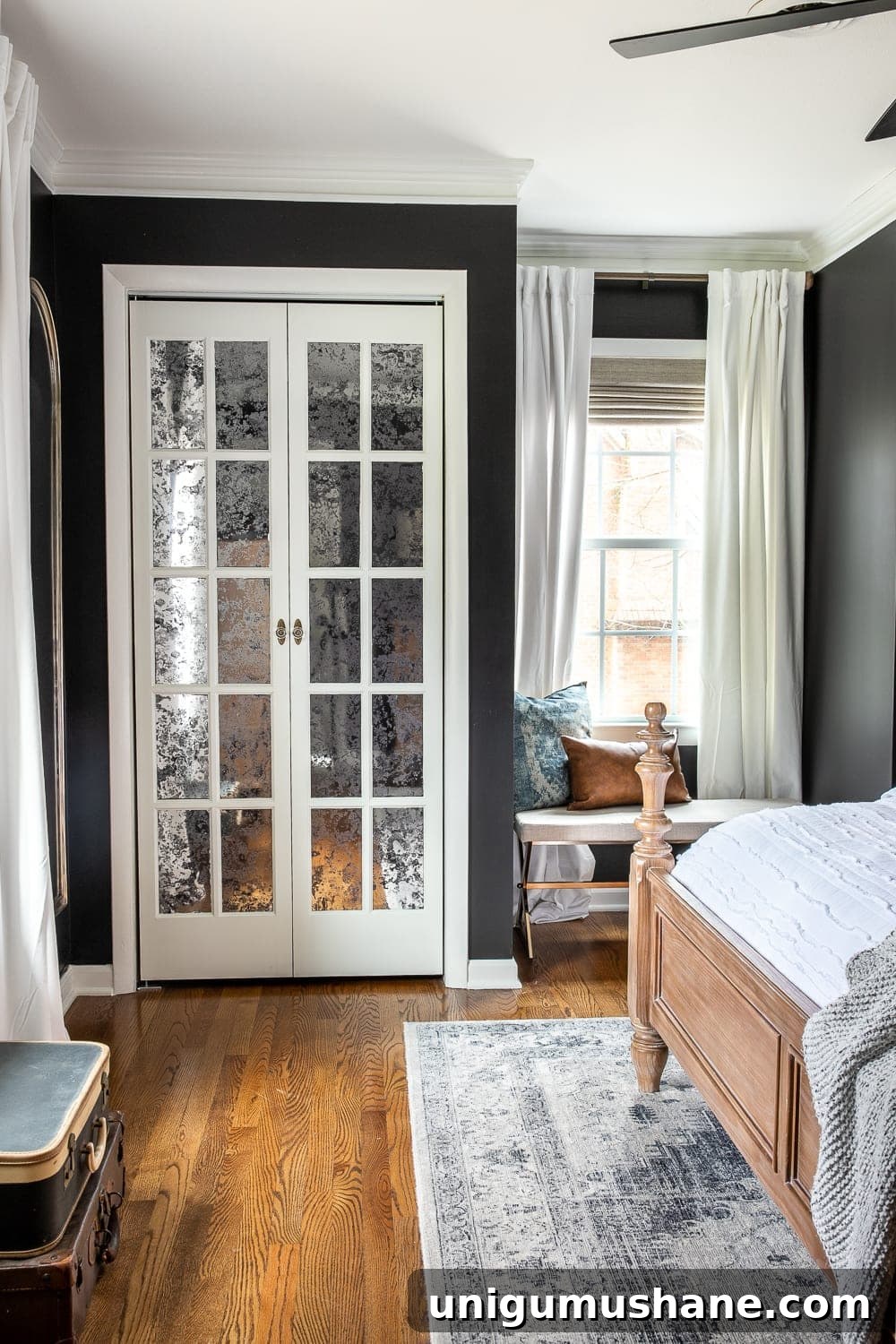 Moody Modern Vintage Master Bedroom Reveal and Design Ideas 10 black master bedroom with French bifold closet doors