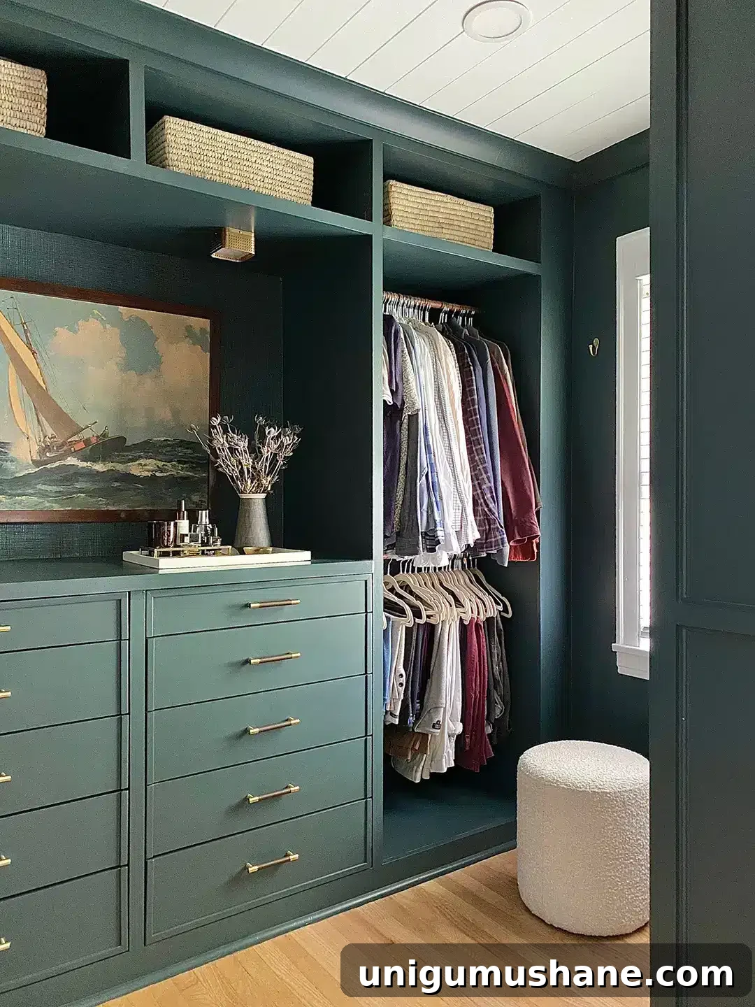 built in drawers in a closet painted green