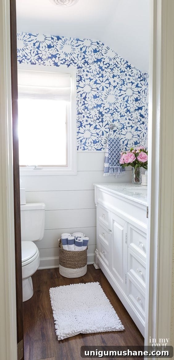 28 Creative DIY Wall Decor Ideas to Transform Your Blank Walls 20 adding a wall stencil as an inexpensive alternative to wallpaper on bathroom walls