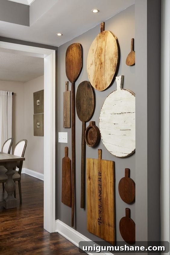 28 Creative DIY Wall Decor Ideas to Transform Your Blank Walls 25 cutting boards hung as a kitchen gallery wall