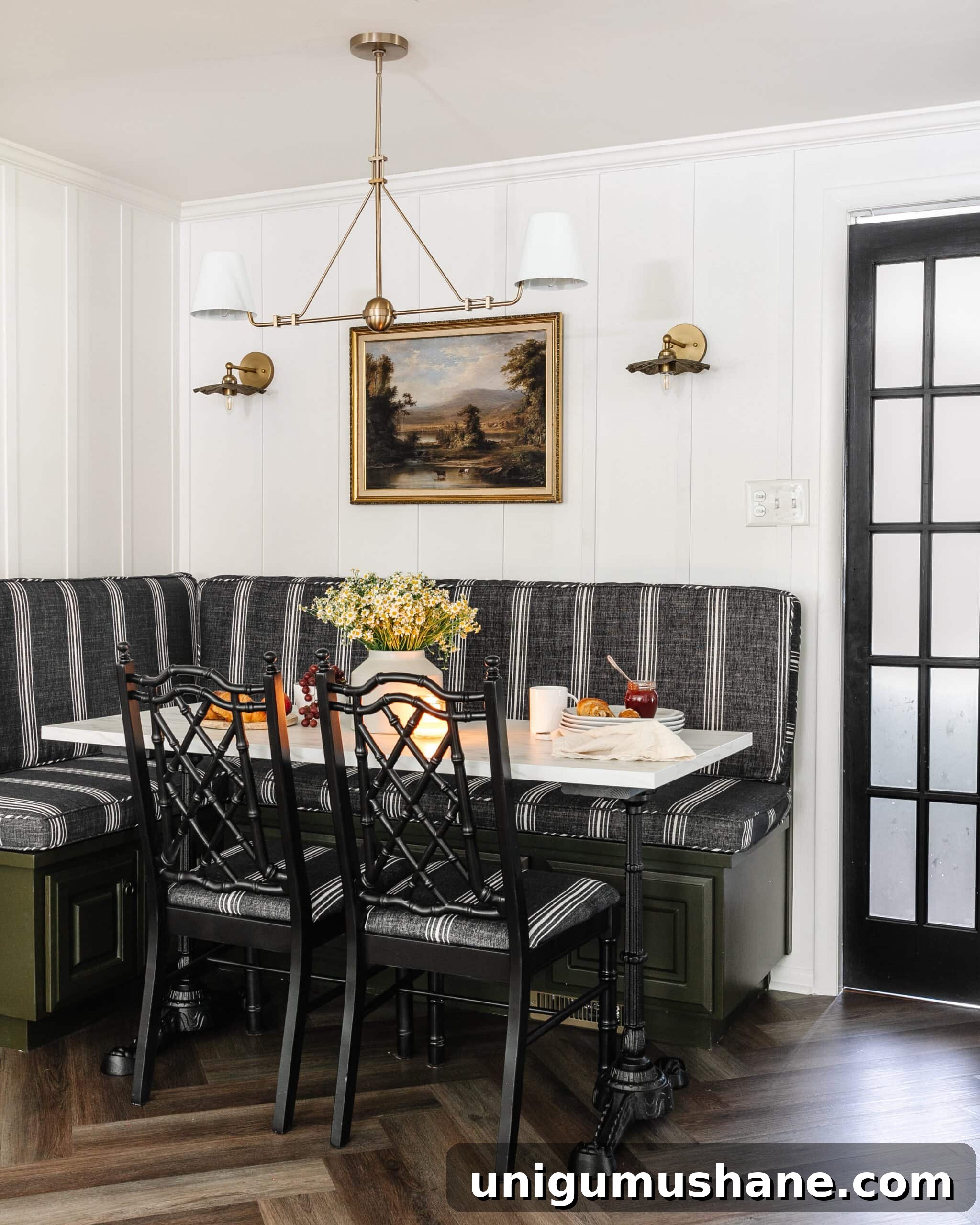40 Affordable Home Decor Ideas Under $100 3 breakfast nook with banquette and DIY faux marble dining table