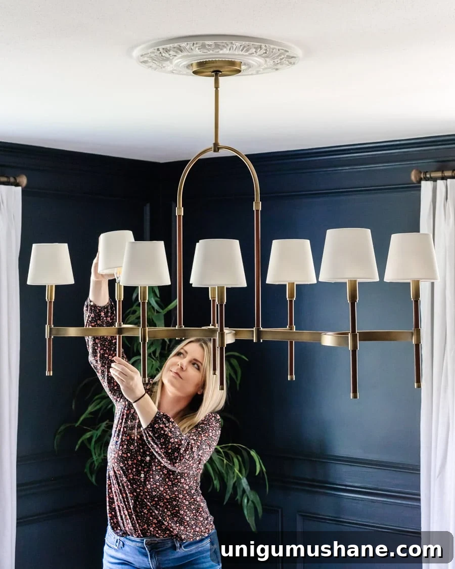 40 Affordable Home Decor Ideas Under $100 10 chandelier installation