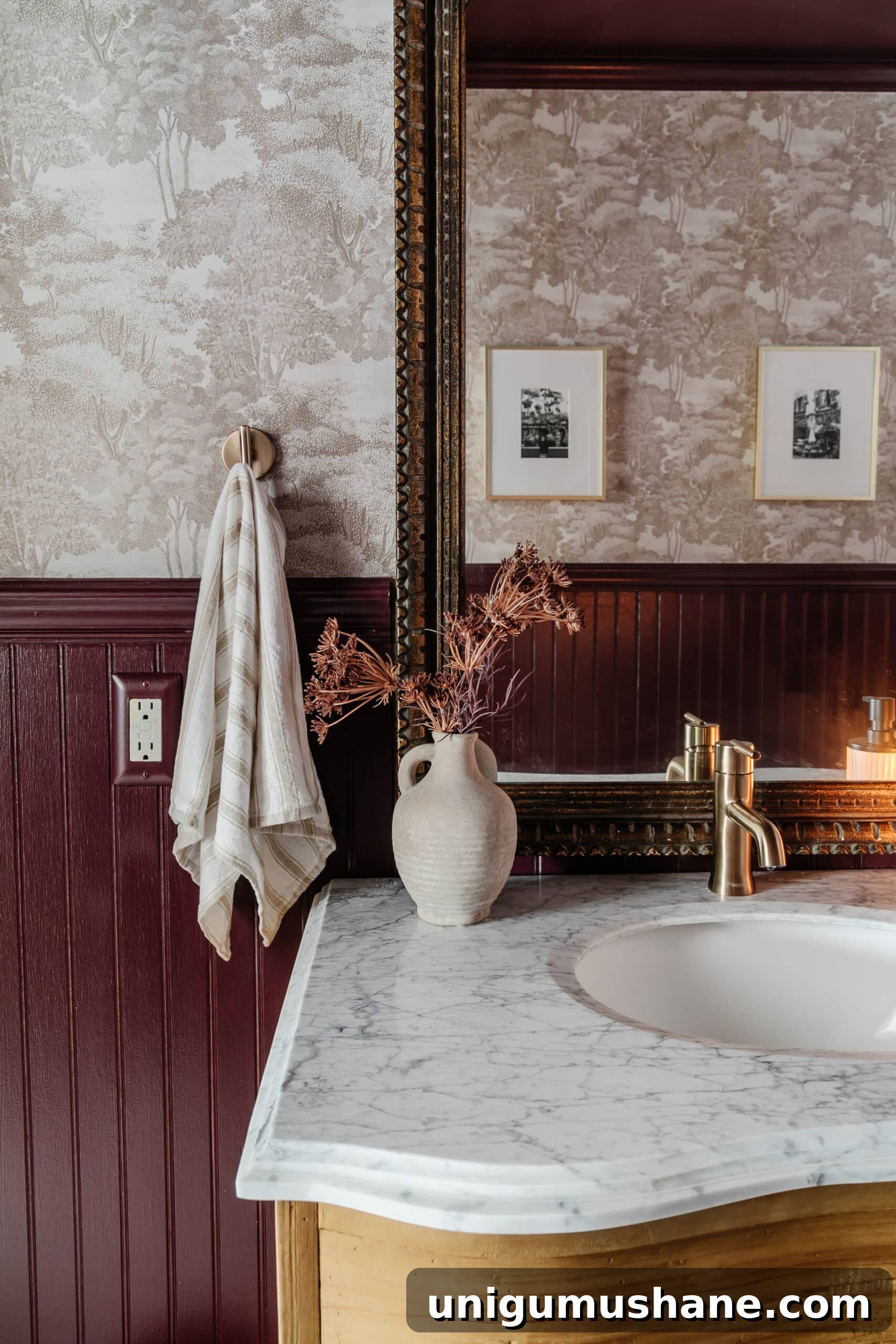 40 Affordable Home Decor Ideas Under $100 11 vintage bathroom mirror with sandberg wallpaper and burgundy painted beadboard