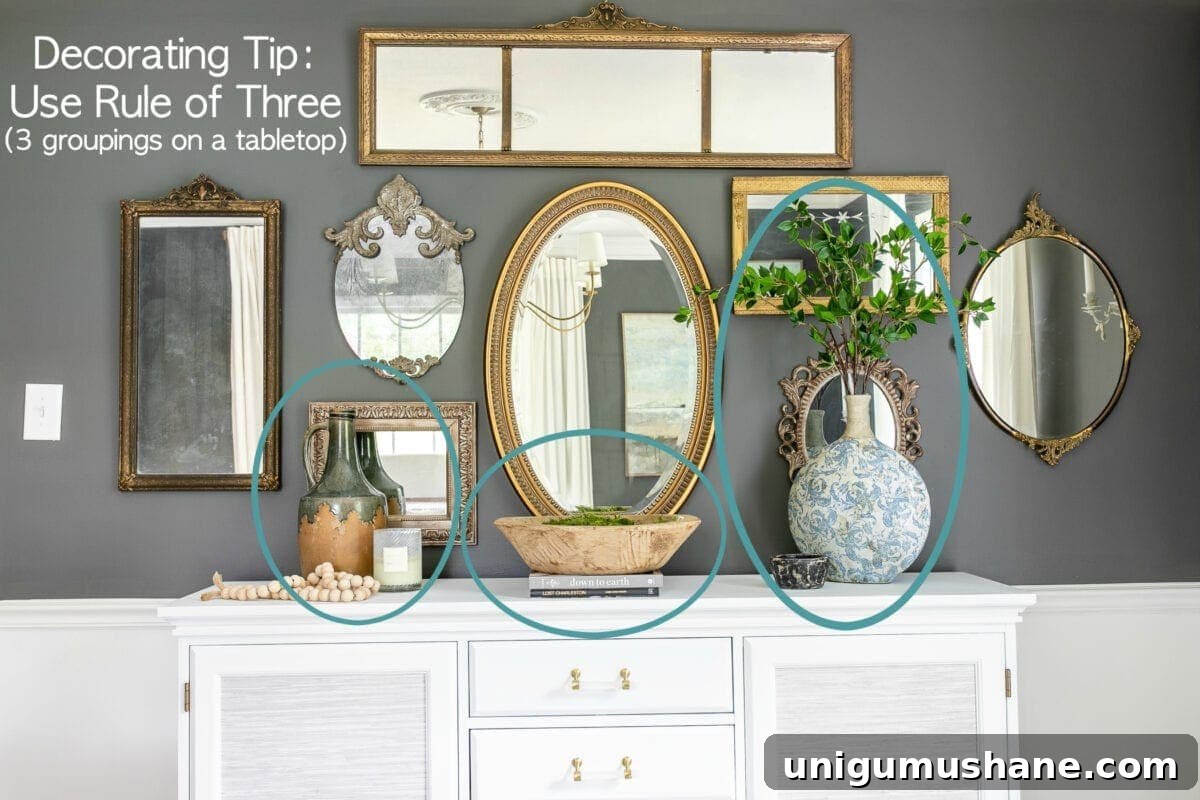 Buffet Table Decor Ideas: How to Style Any Surface 7 Three groups of decor on buffet using rule of three