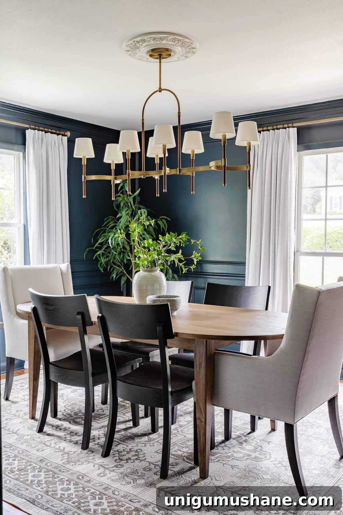 How to Choose Interior Paint Colors Like a Pro 18 dining room painted navy blue Romabio Blue Ridge Parkway with two windows in natural light