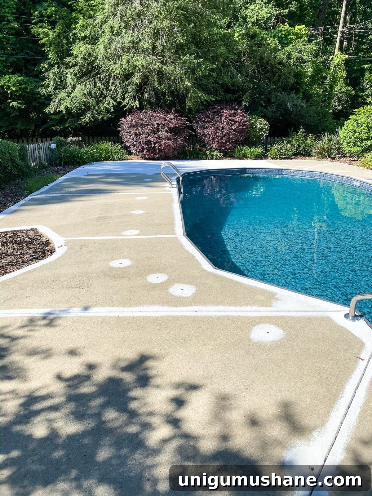 badly painted concrete pool deck