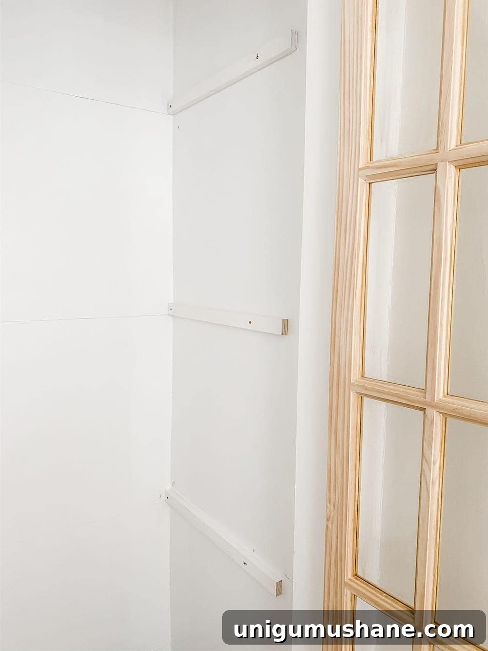 Convert Bifold Closet Doors to French Doors and Install Shelving 11 Shelf braces and plywood installed