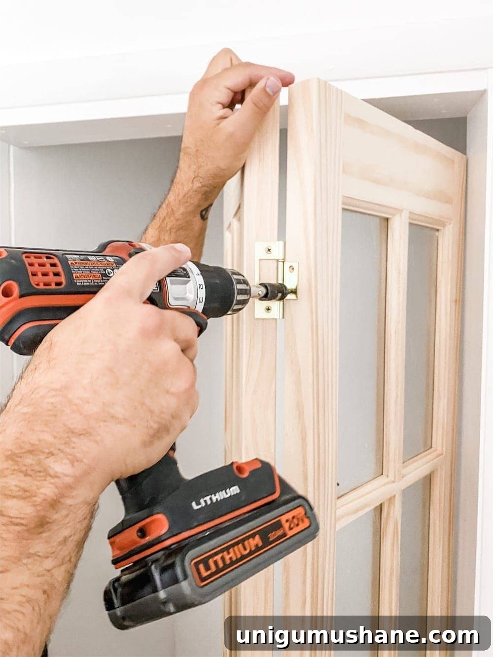 Convert Bifold Closet Doors to French Doors and Install Shelving 4 Removing center hinge from bifold