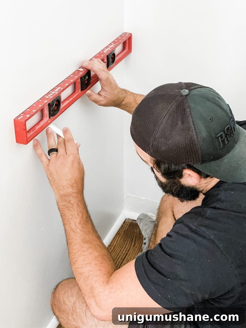 Convert Bifold Closet Doors to French Doors and Install Shelving 8 Marking shelf positions and finding studs