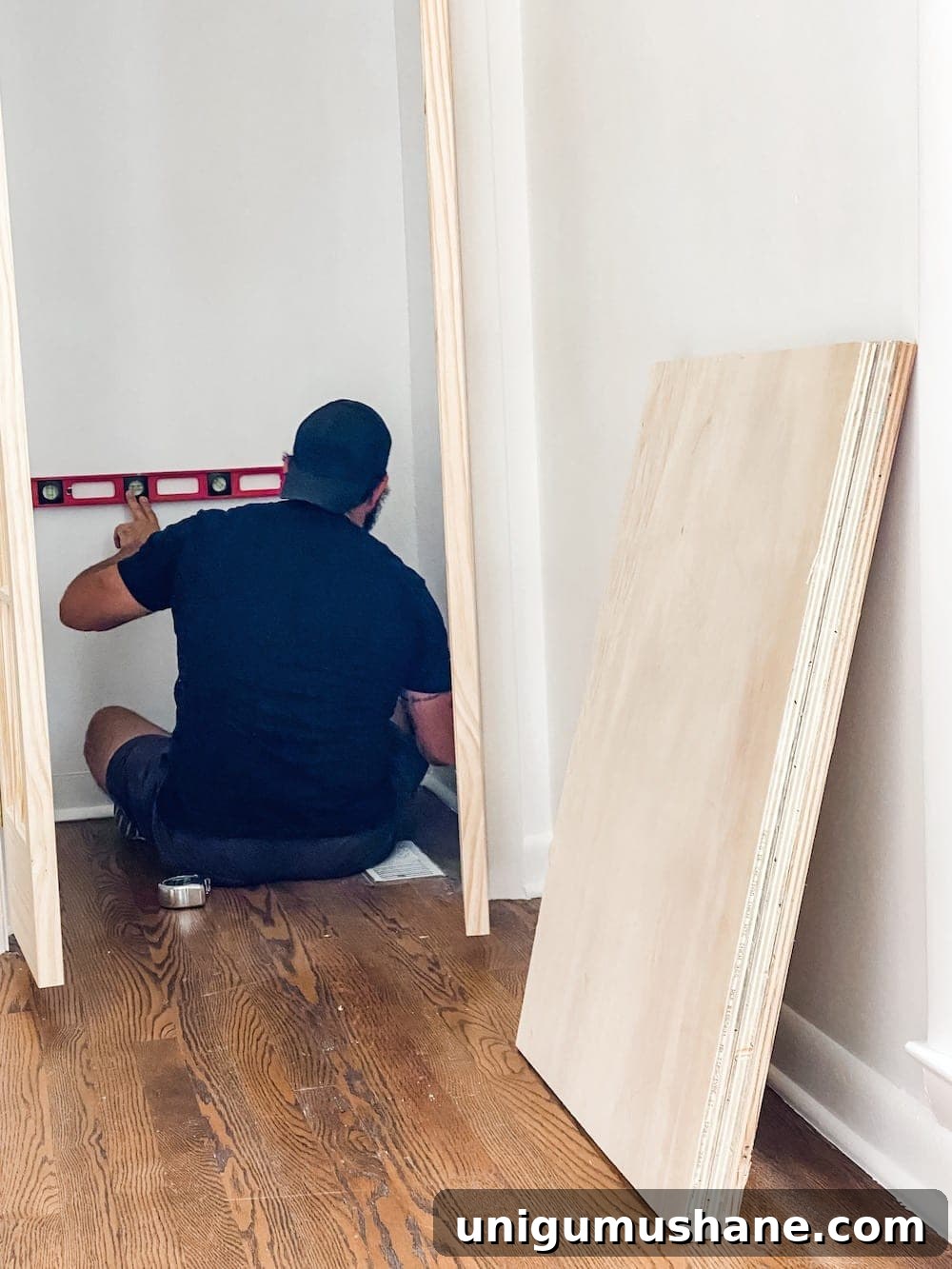 Convert Bifold Closet Doors to French Doors and Install Shelving 9 Cut plywood for shelves