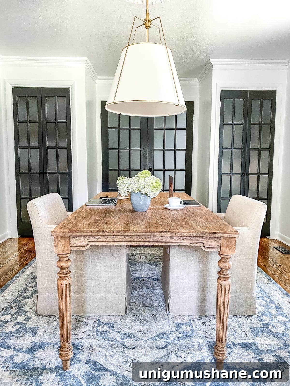Home Office Makeover Reveal Modern Workspace Before and After 6 An outdated dining room gets converted to a light and bright home office with a timeless new look and functional storage.